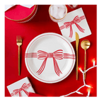 Red and white bow plate with matching napkin holiday tableware from Parte Haus party supply store in Bethesda MD