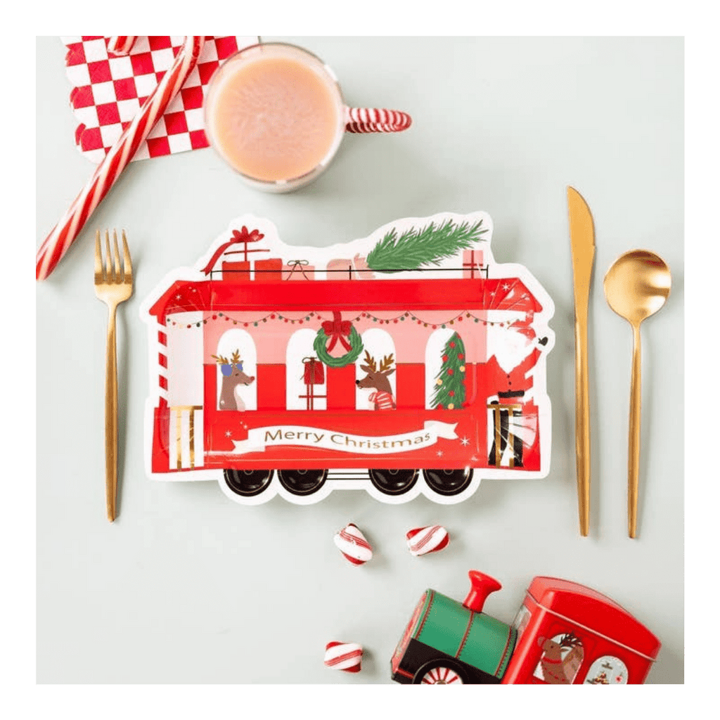 Red Christmas train shaped paper plate with festive holiday design from Parte Haus party supply store in Bethesda Maryland
