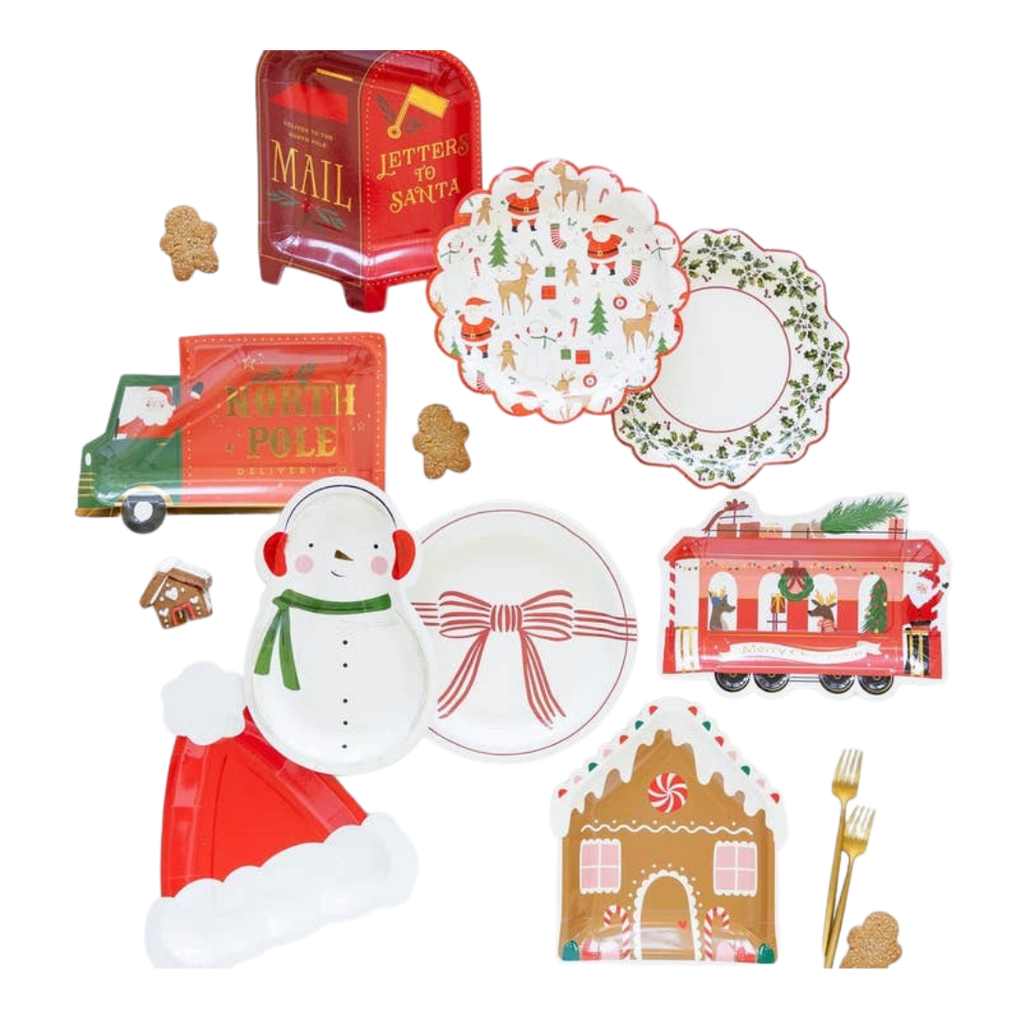 Multicolor Christmas themed plate set with snowman gingerbread house and train from Parte Haus party supply store in Bethesda Maryland