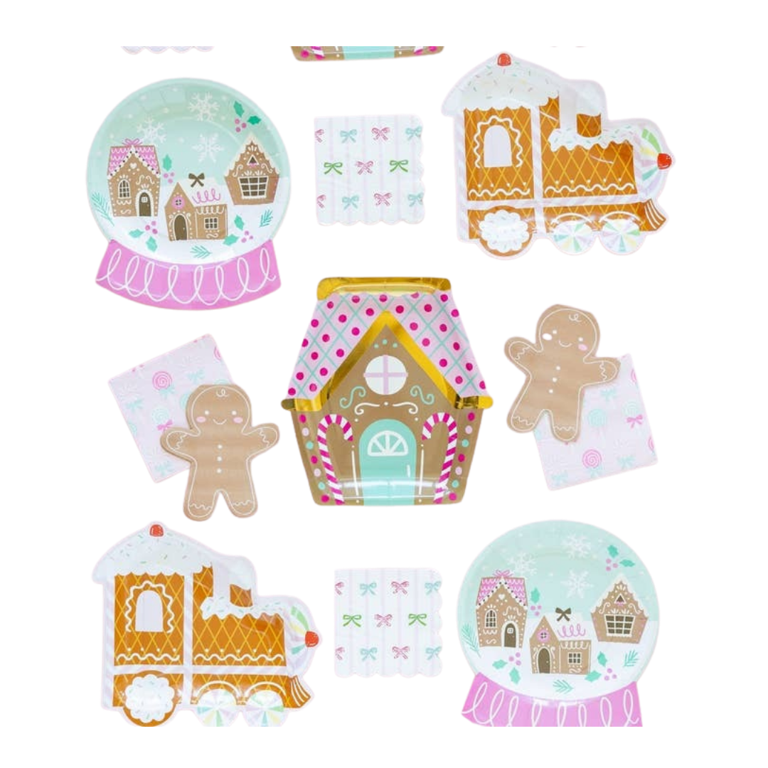 Pastel gingerbread house and train plates and napkins Christmas theme from Parte Haus party supply store in Bethesda MD