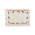 Ivory Christmas placemat with red bows and holly border from Parte Haus party supply store in Bethesda Maryland