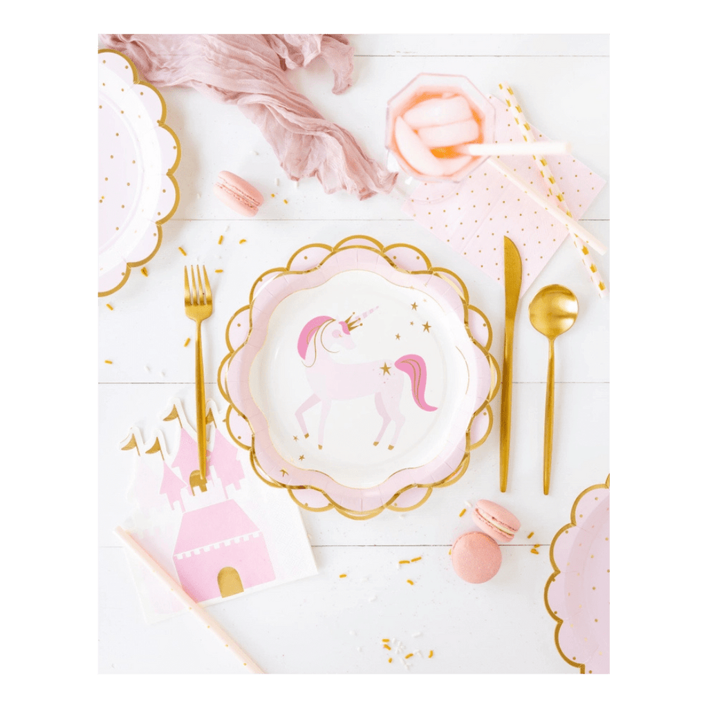 Pink unicorn paper plate and gold cutlery fantasy birthday from Parte Haus party supply store in Bethesda MD