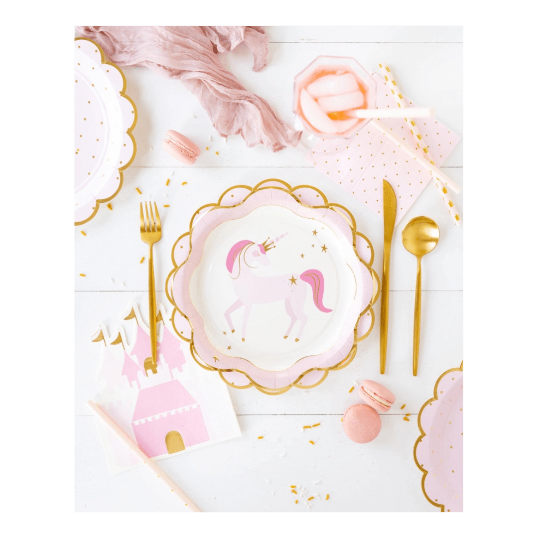 Pink unicorn paper plate and gold cutlery fantasy birthday from Parte Haus party supply store in Bethesda MD