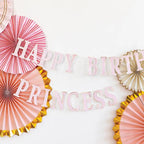 Pink princess happy birthday banner with gold and pink rosettes birthday theme from Parte Haus party supply store in Bethesda Maryland