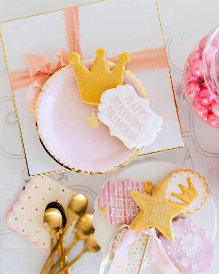 Pink gold princess crown plate with decorative cookies birthday theme from Parte Haus party supply store in Bethesda Maryland