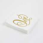 Gold white napkins with elegant script for birthday from Parte Haus party supply store in Bethesda MD