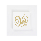 White and gold One paper napkin for first birthday from Parte Haus party supply store in Bethesda MD