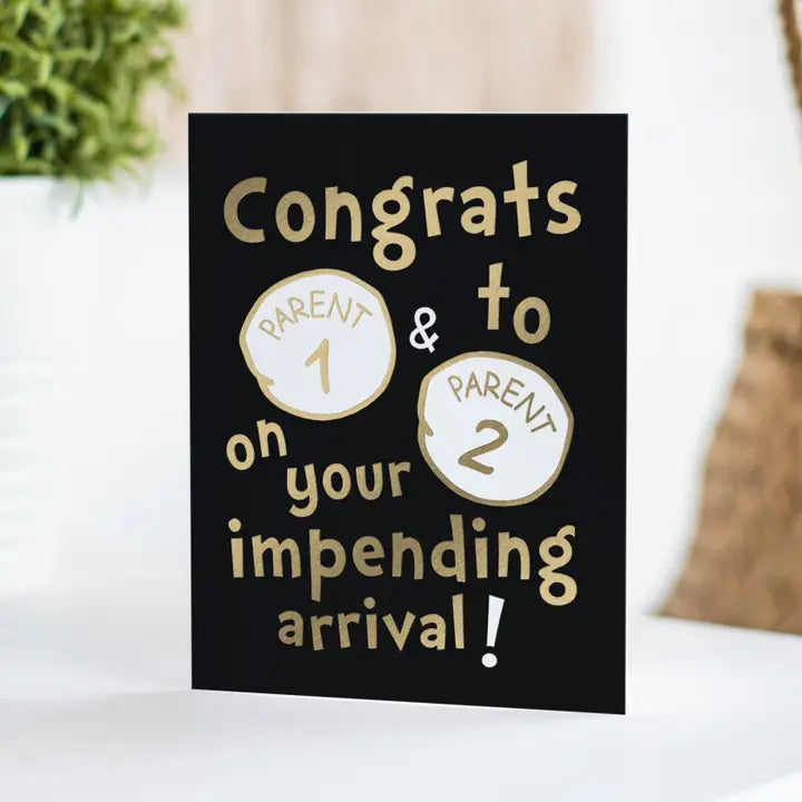Black and gold baby announcement card with parent labels for new baby from Parte Haus party supply store in Bethesda MD