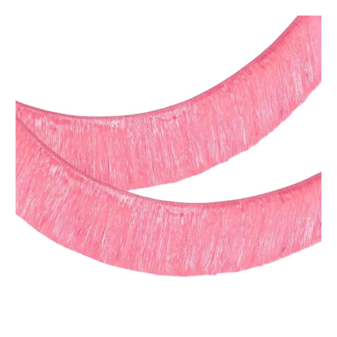 Pink fringe banner decoration for birthday or bachelorette from Parte Haus party supply store in Bethesda Maryland