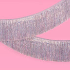 Iridescent fringe foil banner shimmer streamers for birthday decor from Parte Haus party supply store in Bethesda MD