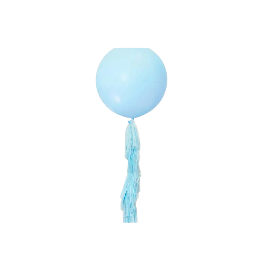 Pastel blue balloon with paper tassel tail for birthday decor from Parte Haus party supply store in Bethesda Maryland