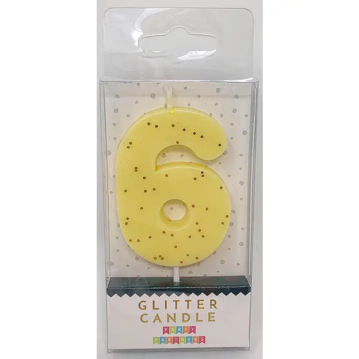 Pastel yellow glitter number 6 candle for birthday celebrations from Parte Haus party supply store in Bethesda MD