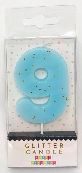 Pastel blue glitter number 9 candle for birthday celebrations from Parte Haus party supply store in Bethesda MD