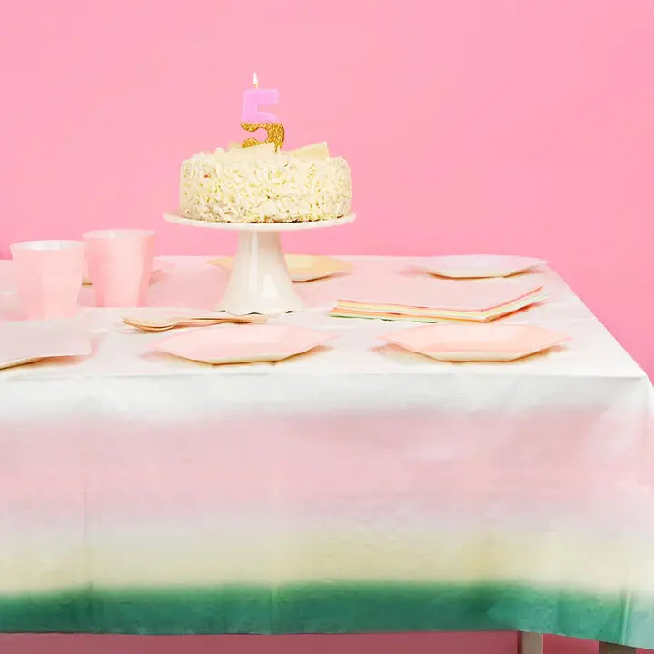 Pastel ombre paper table cover with birthday cake and pink cups for kids birthday from Parte Haus party supply store in Bethesda MD