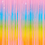 pastel rainbow curtain with vertical stripes birthday decor from Parte Haus party supply store in Bethesda Maryland
