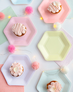 Pastel dinner napkins and plates with frosted cupcakes birthday celebration from Parte Haus party supply store in Bethesda MD