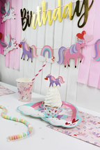 Pastel unicorn garland with rainbows and hearts birthday theme decor from Parte Haus party supply store in Bethesda Maryland