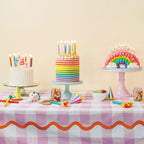 Pastel twisted birthday candles on colorful cakes for birthday from Parte Haus party supply store in Bethesda Maryland