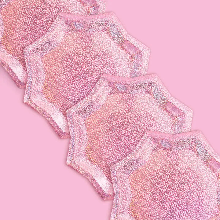 Pink foil starburst plates with glitter edges for birthday or bachelorette from Parte Haus party supply store in Bethesda MD