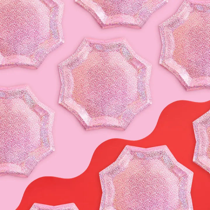 Pink foil starburst plate with glittery surface for bachelorette or birthday from Parte Haus party supply store in Bethesda Maryland