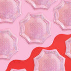 Pink foil starburst plate with glittery surface for bachelorette or birthday from Parte Haus party supply store in Bethesda Maryland