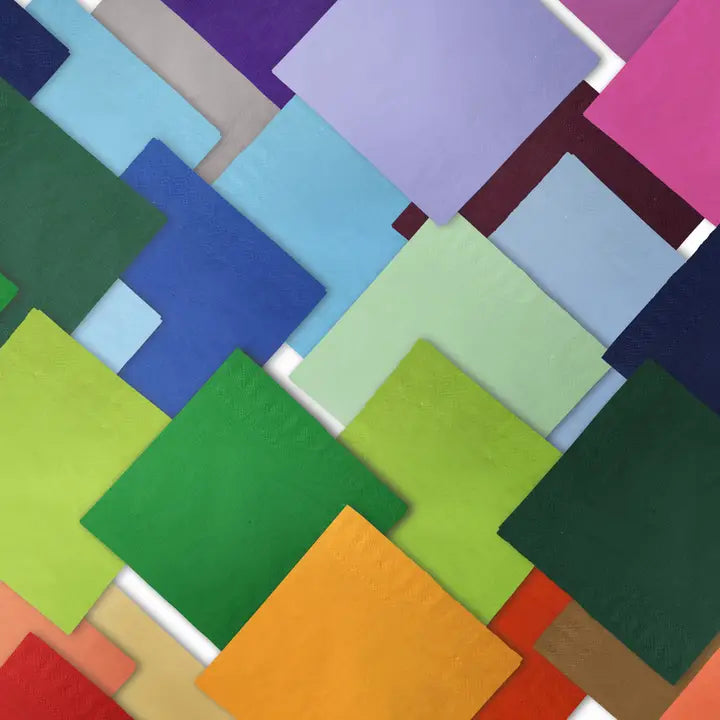 Multicolor paper luncheon napkins arranged flat for birthday or event from Parte Haus party supply store in Bethesda MD