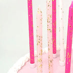 Pink tones gold glitter candle set on birthday cake from Parte Haus party supply store in Bethesda MD