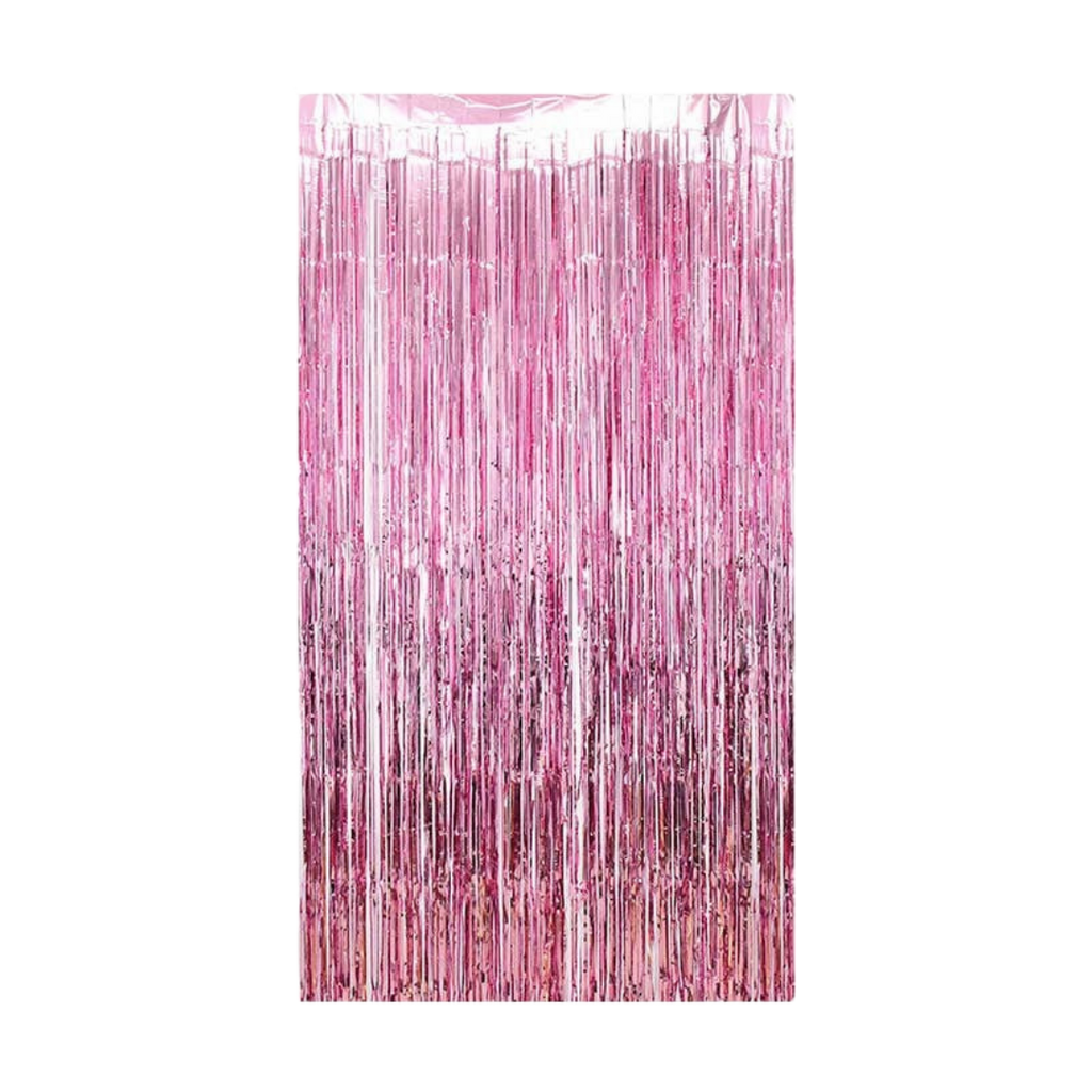 Pink metallic fringe tinsel curtain backdrop for birthday celebration from Parte Haus party supply store in Bethesda MD