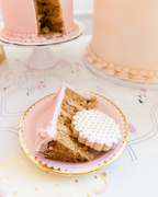 Pink and gold dessert plate with a slice of cake and cookie princess birthday from Parte Haus party supply store in Bethesda MD