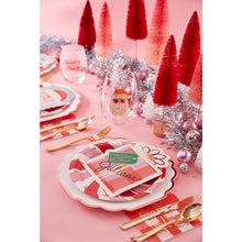 Pink and red peppermint large dinner plates with festive design for Christmas from Parte Haus party supply store in Bethesda MD