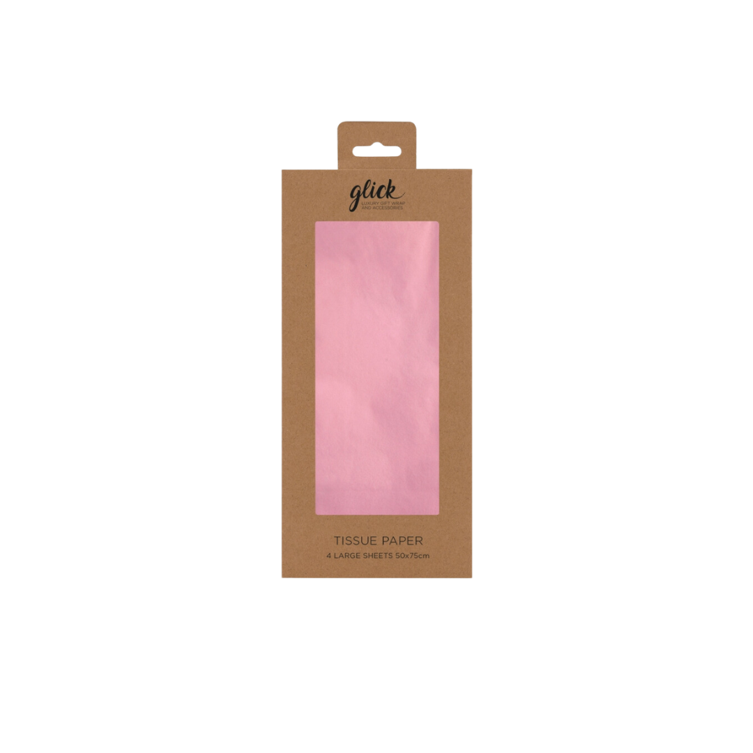 Light pink tissue paper in a brown package gift wrap from Parte Haus party supply store in Bethesda Maryland