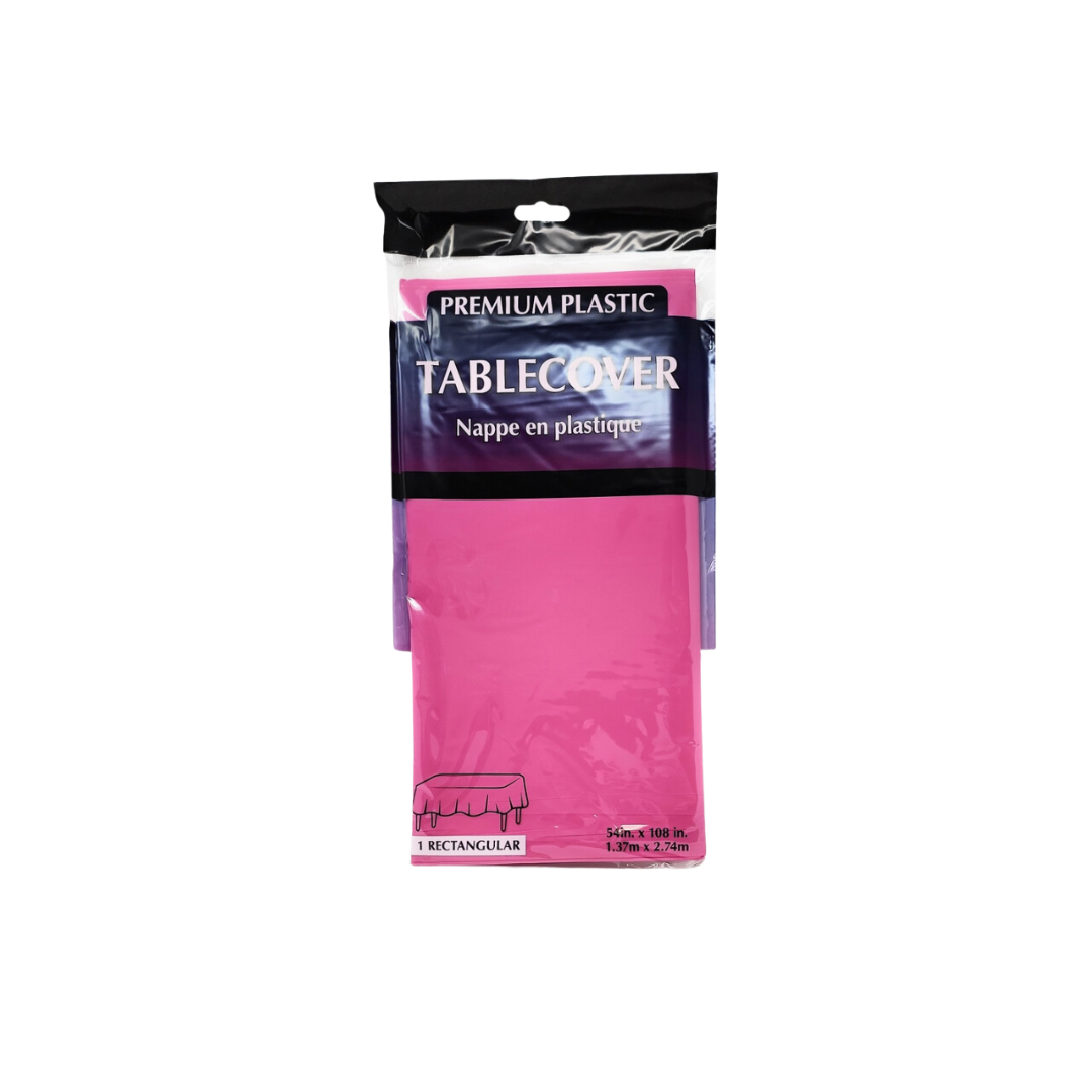 Hot pink plastic table cover in clear packaging for birthday celebrations from Parte Haus party supply store in Bethesda MD