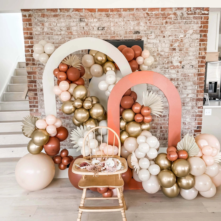 Premium burnt orange balloon arch kit with gold and cream balloons boho birthday from Parte Haus party supply store in Bethesda MD