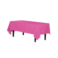 Cerise pink plastic tablecloth covering a rectangular table for celebrations from Parte Haus party supply store in Bethesda MD