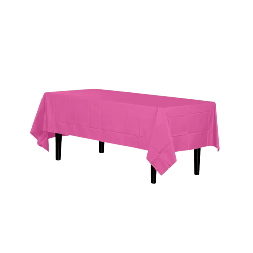 Cerise pink plastic tablecloth covering a rectangular table for celebrations from Parte Haus party supply store in Bethesda MD