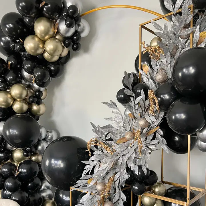 Black gold and silver balloon arch kit with metallic leaves for celebration from Parte Haus party supply store in Bethesda MD