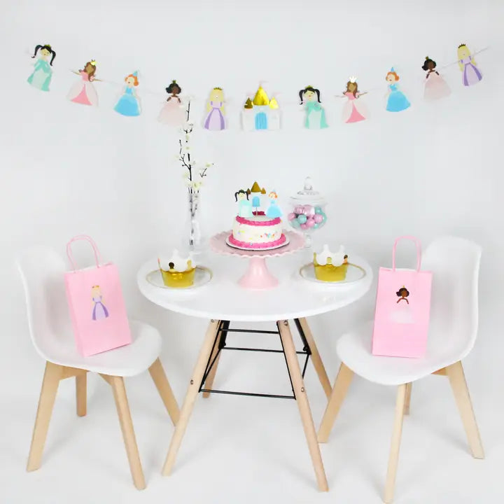 Pink princess birthday party decoration kit with crowns and gift bags for girl birthday theme from Parte Haus party supply store in Bethesda MD