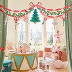 Pink and green nutcracker themed decorations and table setup for Christmas from Parte Haus party supply store in Bethesda MD