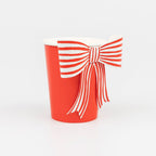 Red paper cup with striped bow festive design from Parte Haus party supply store in Bethesda MD