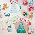 Green Christmas tree plates snowman and gingerbread decor Christmas from Parte Haus party supply store in Bethesda MD