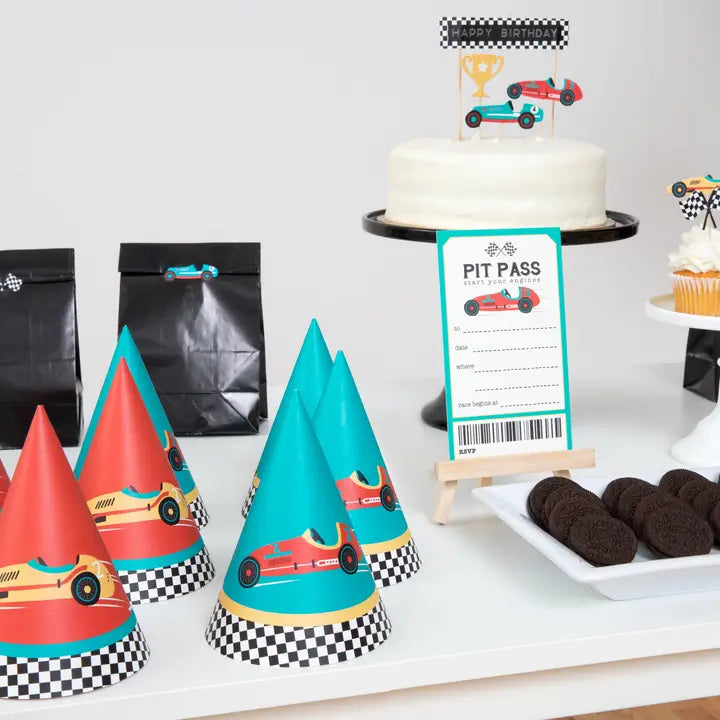 Red and teal race car party hats with checkered trim racing birthday theme from Parte Haus party supply store in Bethesda MD