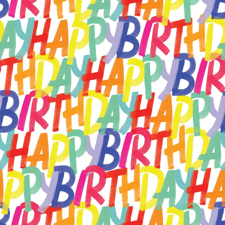 Rainbow birthday gift wrap featuring colorful happy birthday text for birthday from Parte Haus party supply store in Bethesda MD.