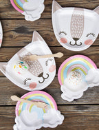 Rainbow dessert plates with clouds and cupcakes for birthday from Parte Haus party supply store in Bethesda MD