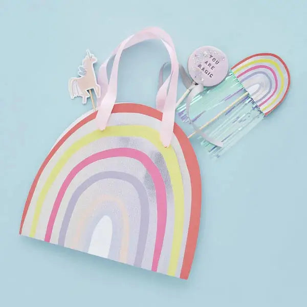 Rainbow pastel party bag with unicorn and you are magic badge birthday theme from Parte Haus party supply store in Bethesda Maryland
