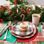 Red and green plaid plates with a holiday cupcake Christmas theme from Parte Haus party supply store in Bethesda MD.