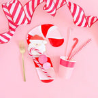 Red and pink candy cane dessert paper plate pack Christmas table setting from Parte Haus party supply store in Bethesda MD