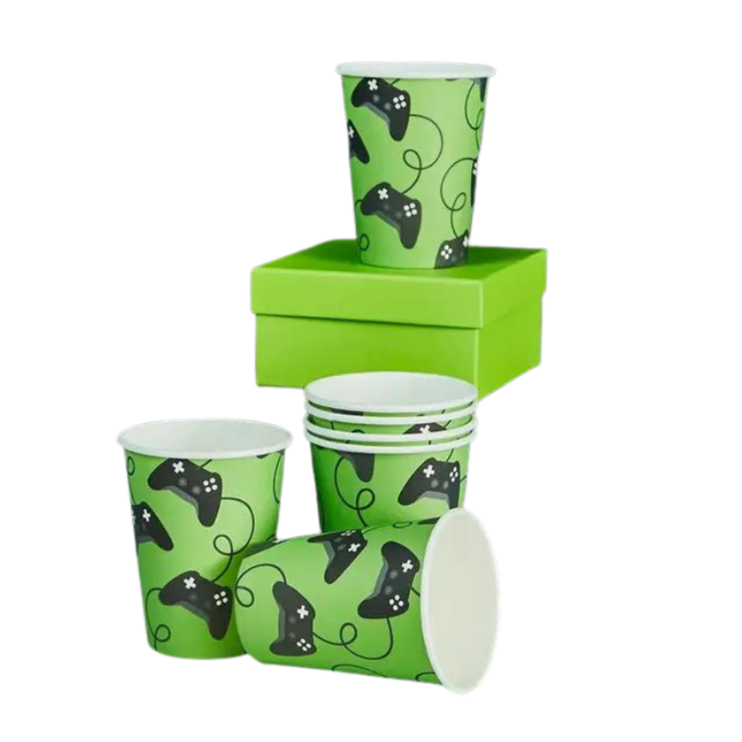 Green gaming paper cups with black controller print birthday theme from Parte Haus party supply store in Bethesda MD