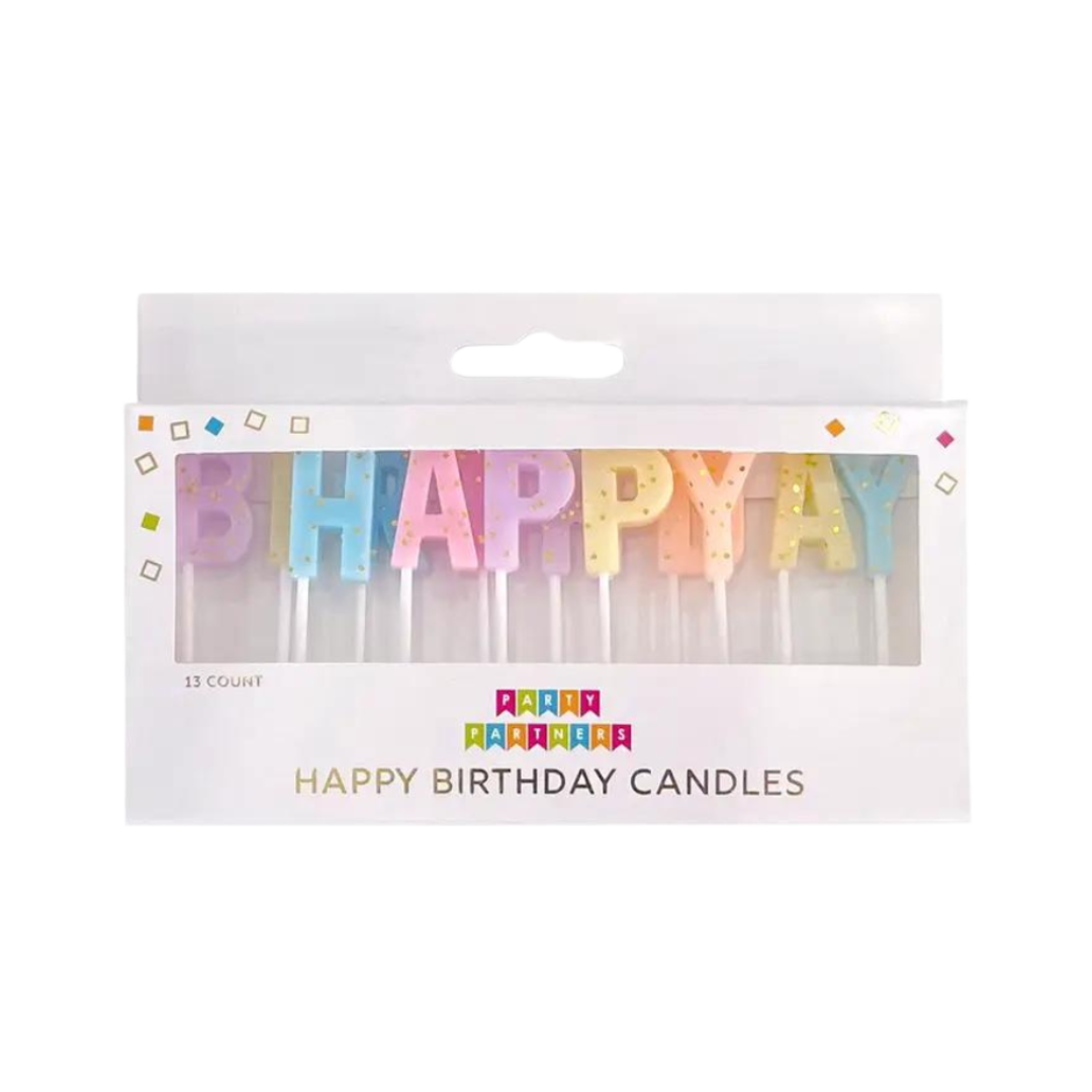 Pastel rainbow Happy Birthday letter candles for birthday cake celebration from Parte Haus party supply store in Bethesda Maryland