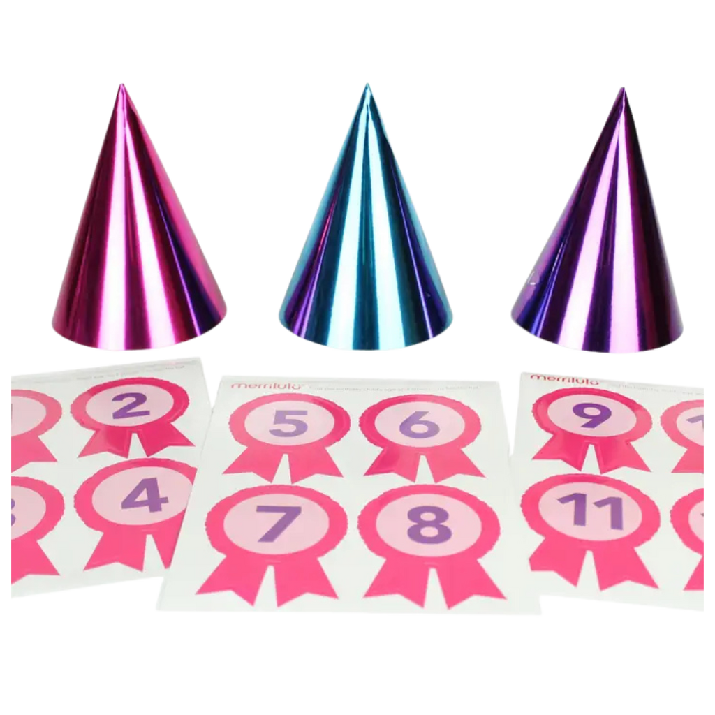Metallic pink and blue cone hats with pink number stickers for birthday from Parte Haus party supply store in Bethesda Maryland
