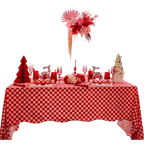 Red and white holiday table decor with checkered tablecloth and floral centerpiece Christmas theme from Parte Haus party supply store in Bethesda Maryland
